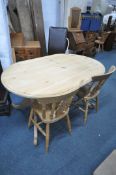 A PINE KITCHEN TABLE, with rounded ends, length 152cm x depth 98cm x height 74cm, and two beech