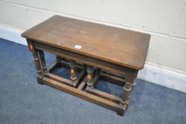 AN OAK COFFEE / NEST OF THREE TABLES, width 69cm x depth 36cm x height 41cm (condition report: -