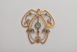 A YELLOW METAL LAVALIER PENDANT, open work scroll pendant, set with a central circular cut