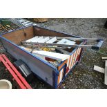 A SINGLE AXLE BOX TRAILER, with tail boards and cables, along with an aluminium step ladder (