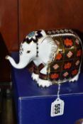 A BOXED ROYAL CROWN DERBY IMARI SMALL ELEPHANT PAPERWEIGHT, introduced in 1990, gold button stopper,