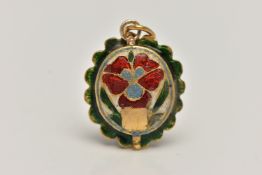 A YELLOW METAL ENAMEL AND DIAMOND SET PENDANT, of an oval form, set with a large central rose cut