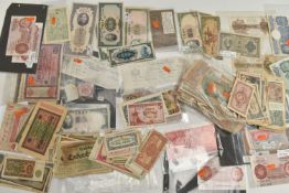 A LARGE QUANTITY OF WORLD BANKNOTES, to include early Treasury 1915 Bradbury Ten Shilling D7,