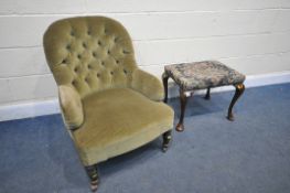 AN EDWARDIAN BUTTON BACK ARMCHAIR, on turned front legs and casters, along with a Georgian style
