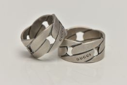 TWO 'GUCCI' WIDE CURB LINK BAND RINGS, each signed 'Gucci' stamped 925 Swiss control marks, ring