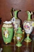 FOUR EARLY 20TH CENTURY COALPORT GREEN AND GILT GROUND EWERS AND VASES, comprising a pair of