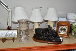 FOUR VARIOUS TABLE LAMPS, LATE VICTORIAN BROWN GLASS LUSTRE, A HEREDITIES BRONZED RESIN 'ANGLERS'