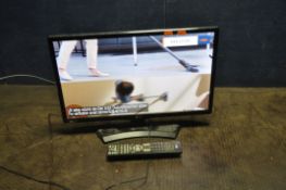 A LG 22MT49DF 22in TV with remote (PAT pass and working) (Condition: some scratches to middle of
