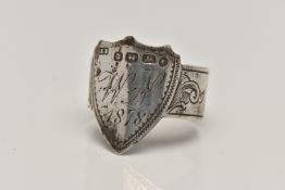 A SILVER SHEILD RING, a silver plaque converted into a ring, hallmarked Birmingham 1876, approximate