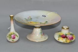 THREE PIECES OF ROYAL WORCESTER PORCELAIN, comprising a comport painted with roses, iron red no. W