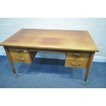 A MID CENTURY TEAK DESK, with four drawers, width 138cm x depth 76cm x height 76cm (condition