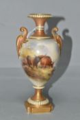 A ROYAL WORCESTER TWIN HANDLED URN HAND PAINTED WITH HIGHLAND CATTLE BY HARRY STINTON, signed,