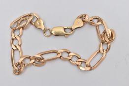 A YELLOW METAL BRACELET, a figaro bracelet, fitted with a lobster clasp, approximate length 199mm,