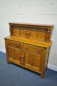 AN OAK COURT CUPBOARD, with two drawers, width 131cm x depth 50cm x height 130cm (condition