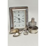 AN ASSORTMENT OF SILVER AND WHITE METAL ITEMS, to include a silver framed mantle clock signed 'Ari D