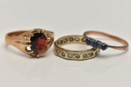 THREE GEM SET RINGS, the first an oval cut garnet, prong set in yellow metal, unmarked,