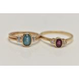 TWO 9CT GOLD GEM SET RINGS, the first set with an oval cut blue topaz, collet set to a white metal