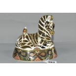 A ROYAL CROWN DERBY IMARI ZEBRA PAPERWEIGHT, issued 1995-1998, gold button stopper, height 13cm (