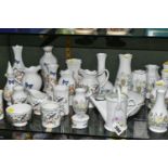 A COLLECTION OF AYNSLEY GIFTWARE, comprising assorted bud vases and trinket pots, patterns
