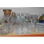 A GROUP OF CUT CRYSTAL AND COLOURED GLASS, comprising a large Edinburgh Crystal champagne coupe, a