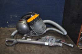 A DYSON DC28C VACUUM CLEANER with various attachments but no floor head (PAT pass and working)