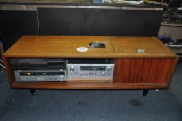 A BESPOKE VINTAGE TEAK HI CABINET CONTAINING COMPONENT HI FI EQUIPMENT including a BSR McDonald