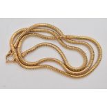 A 9CT GOLD SNAKE CHAIN NECKLACE, a yellow gold chain, fitted with a spring clasp, approximate length