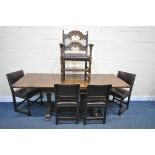 A REPRODUCTION OAK TRESTLE DRAW LEAF DINING TABLE, on square tapered legs, with foliate detailing,