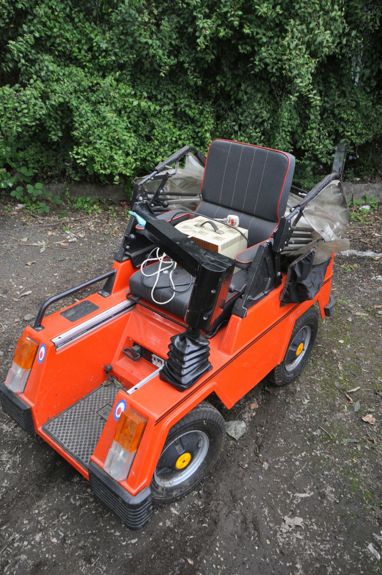 A CLASSIC 1984 VESSA TREKKA ORANGE MOBILITY SCOOTER, with rain cover and charger (untested) ( - Image 3 of 6