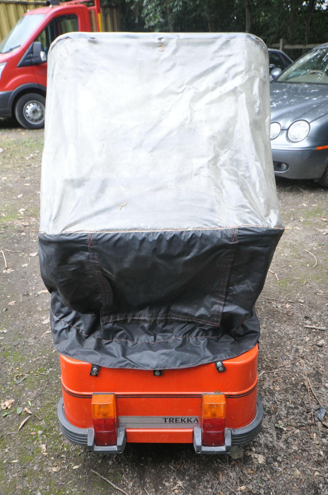 A CLASSIC 1984 VESSA TREKKA ORANGE MOBILITY SCOOTER, with rain cover and charger (untested) ( - Image 6 of 6
