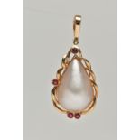 A MABE PEARL AND RUBY PENDANT, a pear Mabe pearl collet set in yellow metal accented with four