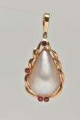 A MABE PEARL AND RUBY PENDANT, a pear Mabe pearl collet set in yellow metal accented with four