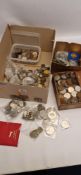A HEAVY BOX CONTAINING WORLD COINS AND BANKNOTES, to include mixed world coinage 11 x UK £5 coins