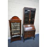 AN EDWARDIAN MAHOGANY AND INLAID SINGLE DOOR DISPLAY CABINET, enclosing two fixed shelves, on an