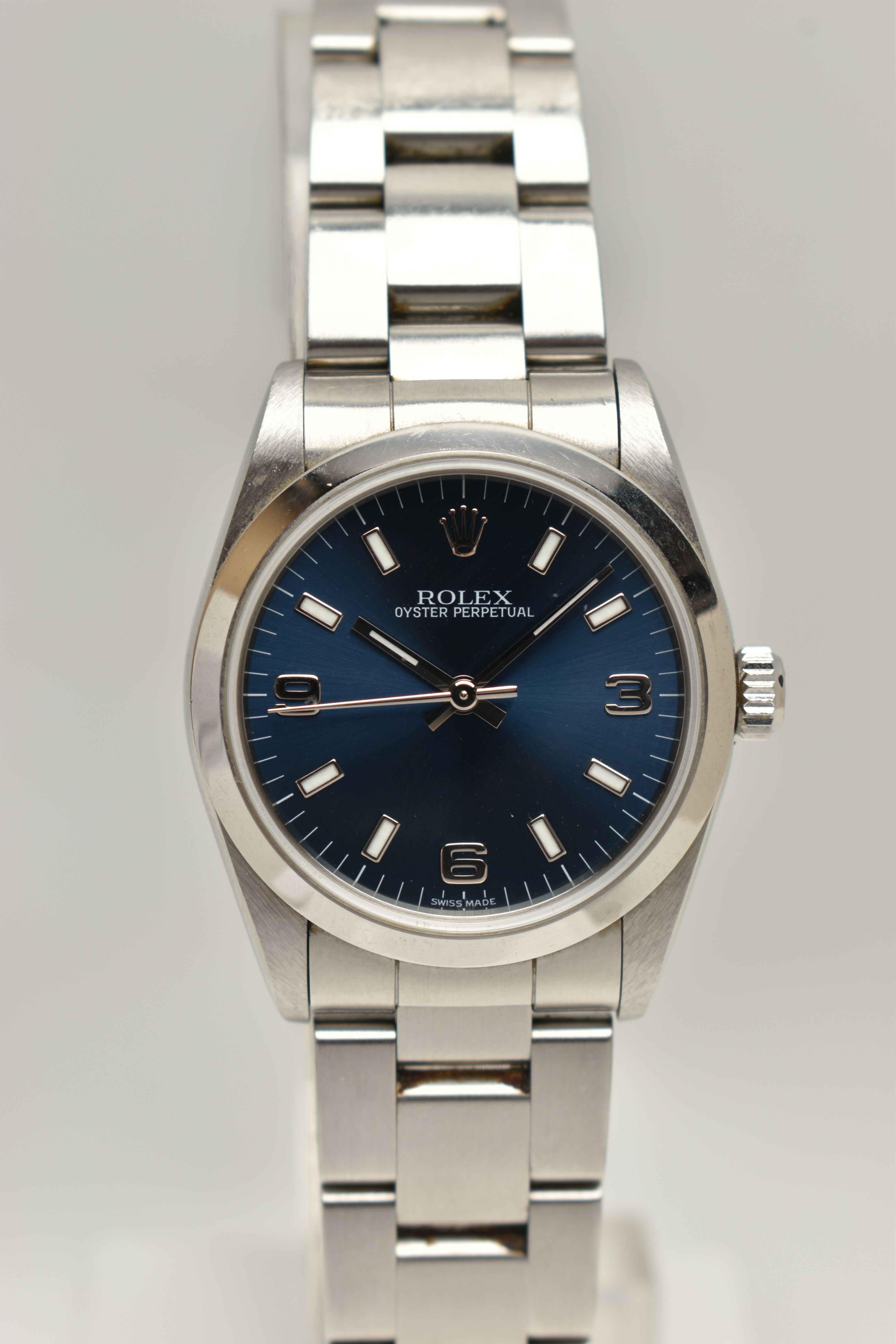 A BOXED STAINLESS STEEL ROLEX OYSTER PERPETUAL AUTOMATIC WRISTWATCH, blue dial with baton