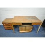 A MID 20TH CENTURY OAK DESK, with two drawers, width 138cm x depth 77cm x height 77cm, along with an
