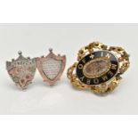 A VICTORIAN MOURNING BROOCH AND A SWEET HEART BROOCH, the yellow metal and black enamel mourning