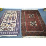 A WOOLLEN AFGHAN WAR RUG, with a cream field, 176cm x 110cm, and a red woollen geometric rug,