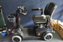 AN INVACARE LEO MOBILITY SCOOTER with charger (battery flat, does not appear to charge) and a box