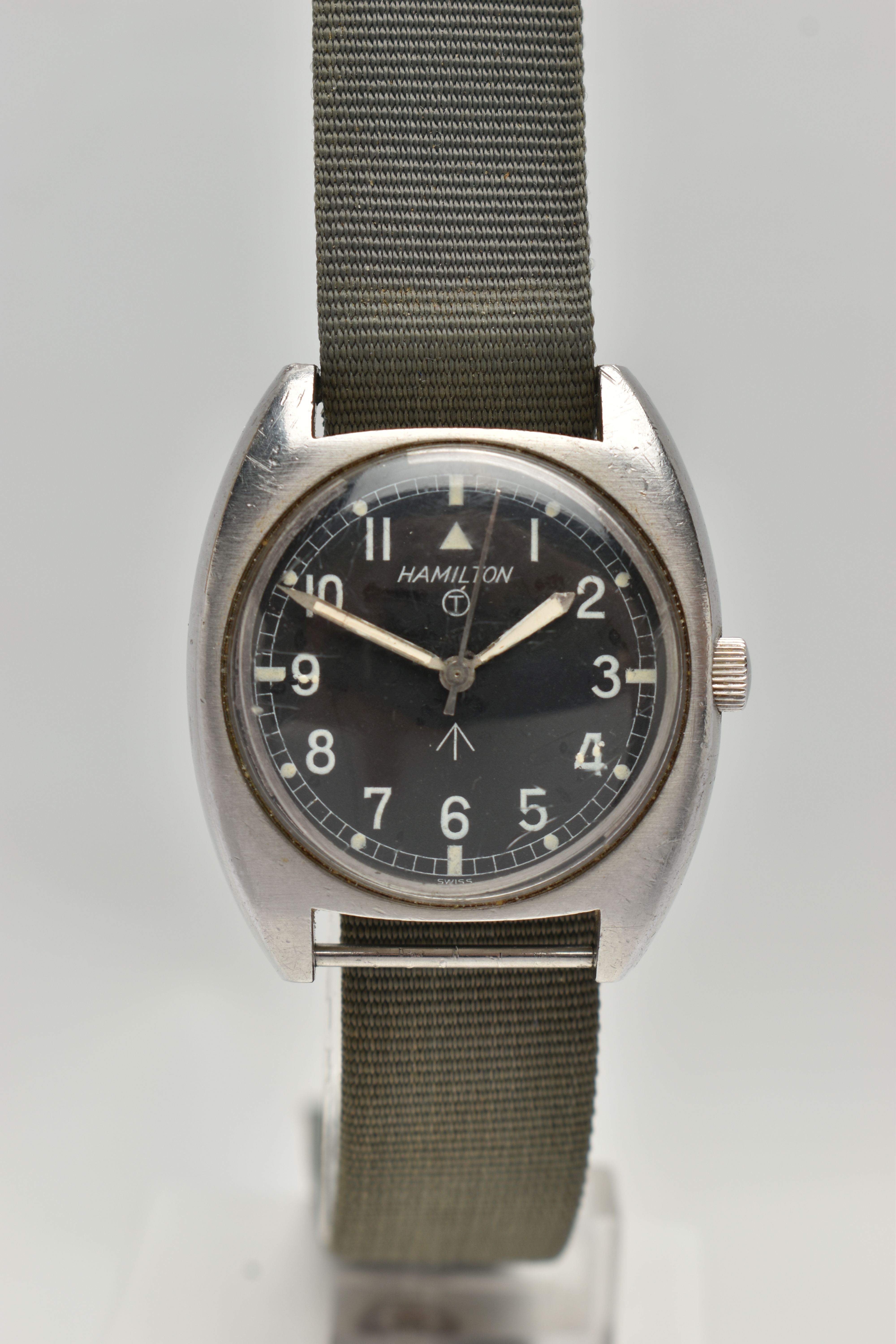 A VINTAGE HAMILTON BRITISH MILITARY ISSUE WRISTWATCH WITH BROAD ARROW SYMBOL, matt black dial with