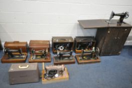 A SELECTION OF VINTAGE SINGER SEWING MACHINES, to include a four wooden cased, three others, and a