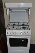 A NEW WORLD GAS COOKER with eye level grill width 54cm x depth 60cm x height 143cm (ignition PAT