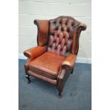 A RED LEATHER CHESTERFIELD WING BACK ARMCHAIR, on cabriole legs, width 83cm x depth 85cm x height