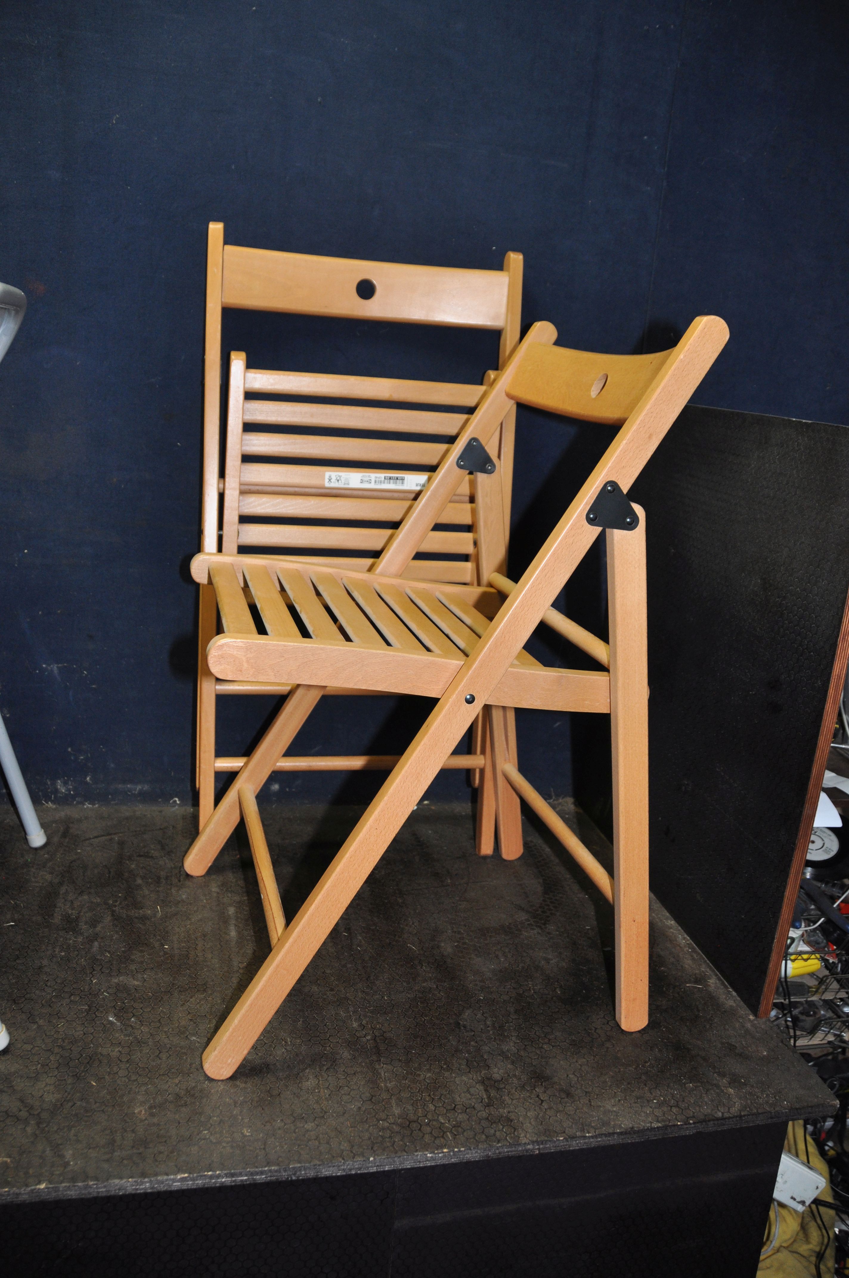 A PAIR OF IKEA TERJE FOLDING CHAIRS, a folding metal chair and a small set of steps (4)