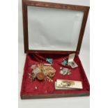 AN ASSORTMENT OF ITEMS, to include an assortment of costume jewellery, together with a large display