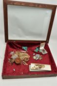 AN ASSORTMENT OF ITEMS, to include an assortment of costume jewellery, together with a large display