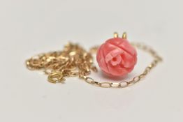 A FLORAL CORAL PENDANT, a carved coral pendant fitted with a gold plated bail, also together with an