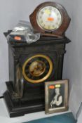 A LATE 19TH CENTURY BLACK SLATE CLOCK, engraved decoration to front, two columns, brass bezel, Roman