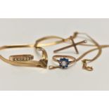 AN ASSORTMENT OF 9CT GOLD JEWELLERY, to include a rose gold cross pendant, two gem set rings and