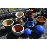 A SELECTION OF GLAZED GARDEN POTS, to include a plant pot, with floral decoration, diameter 38cm x